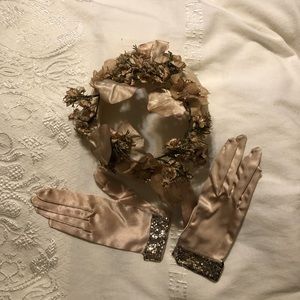 Antique pink hat with paper-like flowers.   It’s with antique gloves that match.